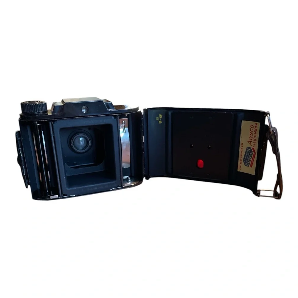 Black Film Photography Camera with Textured Body and Circular Lens UNTESTED